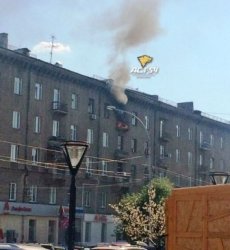 Квартира загорелась на центральной улице Новосибирска